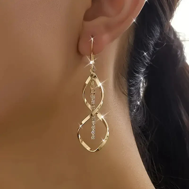 Elara – Spiral Gold Earrings